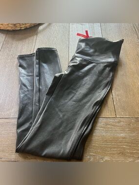 Spanx liquid faux leather look leggings. Size medium